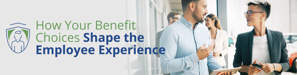 How Your Benefit Choices Shape the Employee Experience. Co-Workers in an office discussing employee benefits